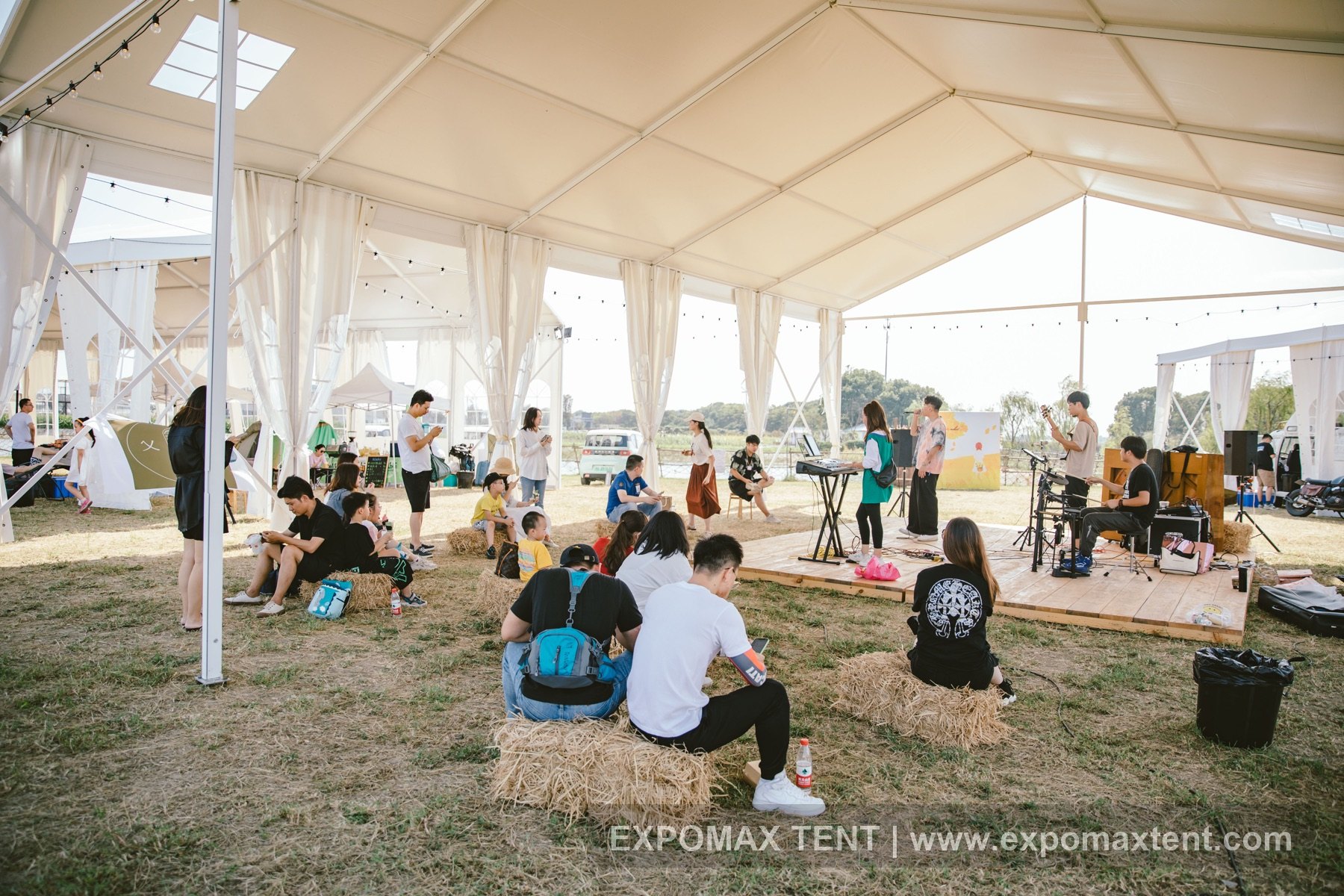 Outdoor leisure event and stage inside a tent