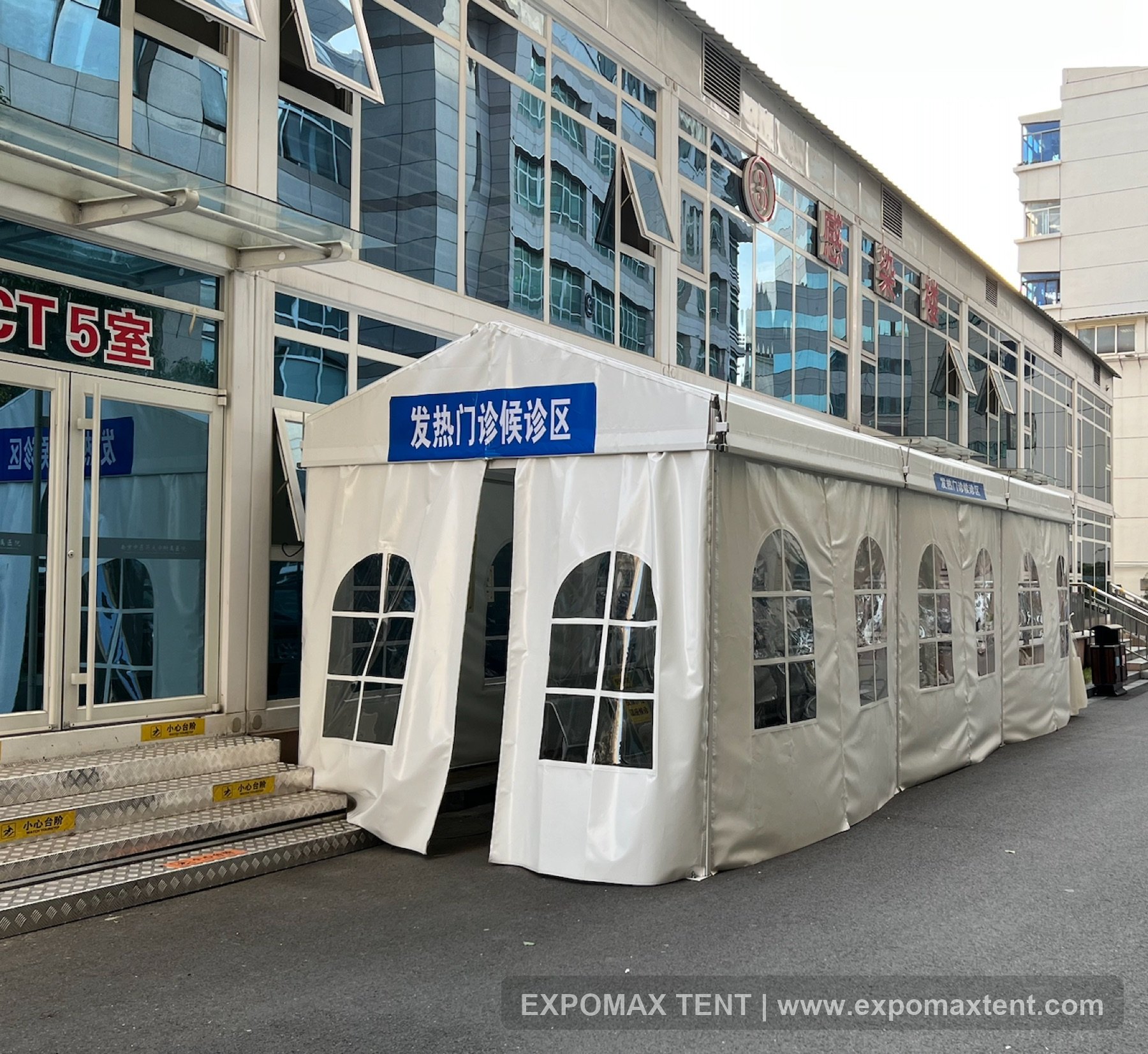 Temporary medical waiting tent outside a hospital