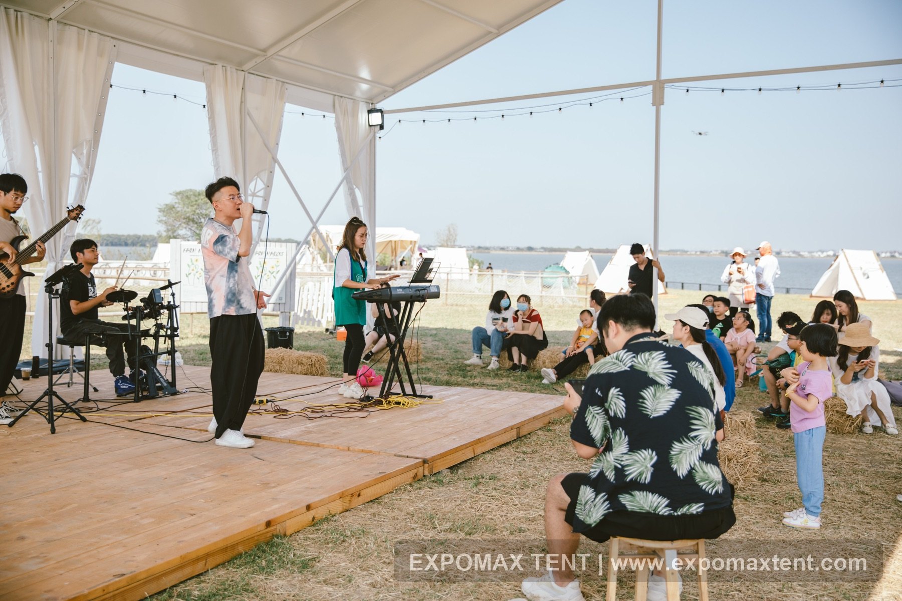 Outdoor performance event under a tent