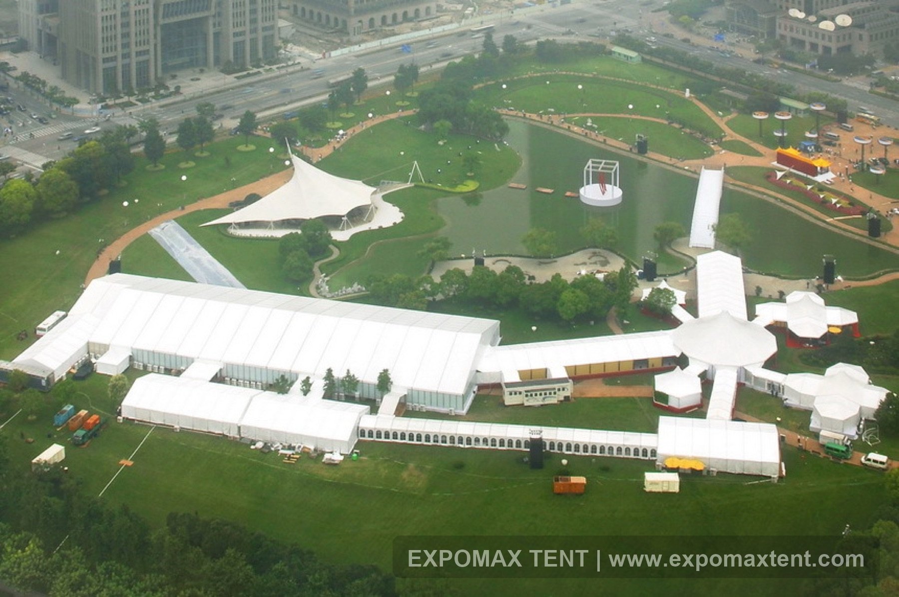 Large connected event tent complex in a park