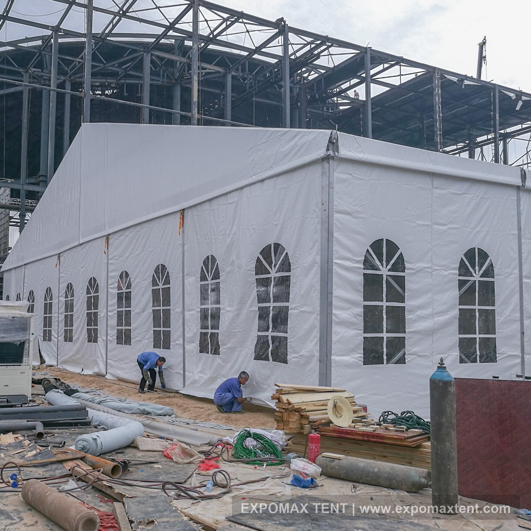 Square event tent at an outdoor site