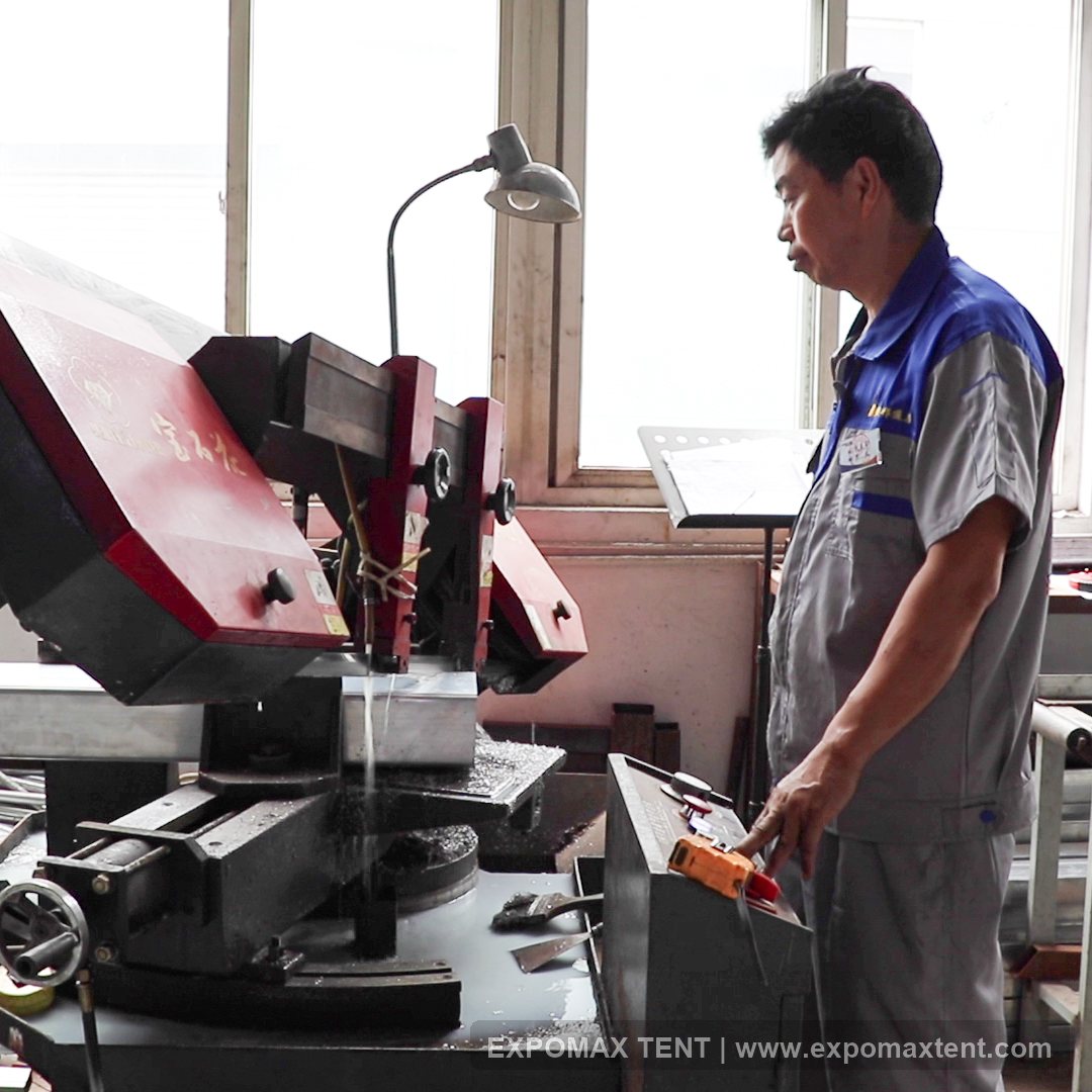 Aluminum profile cutting process inside EXPOMAX factory