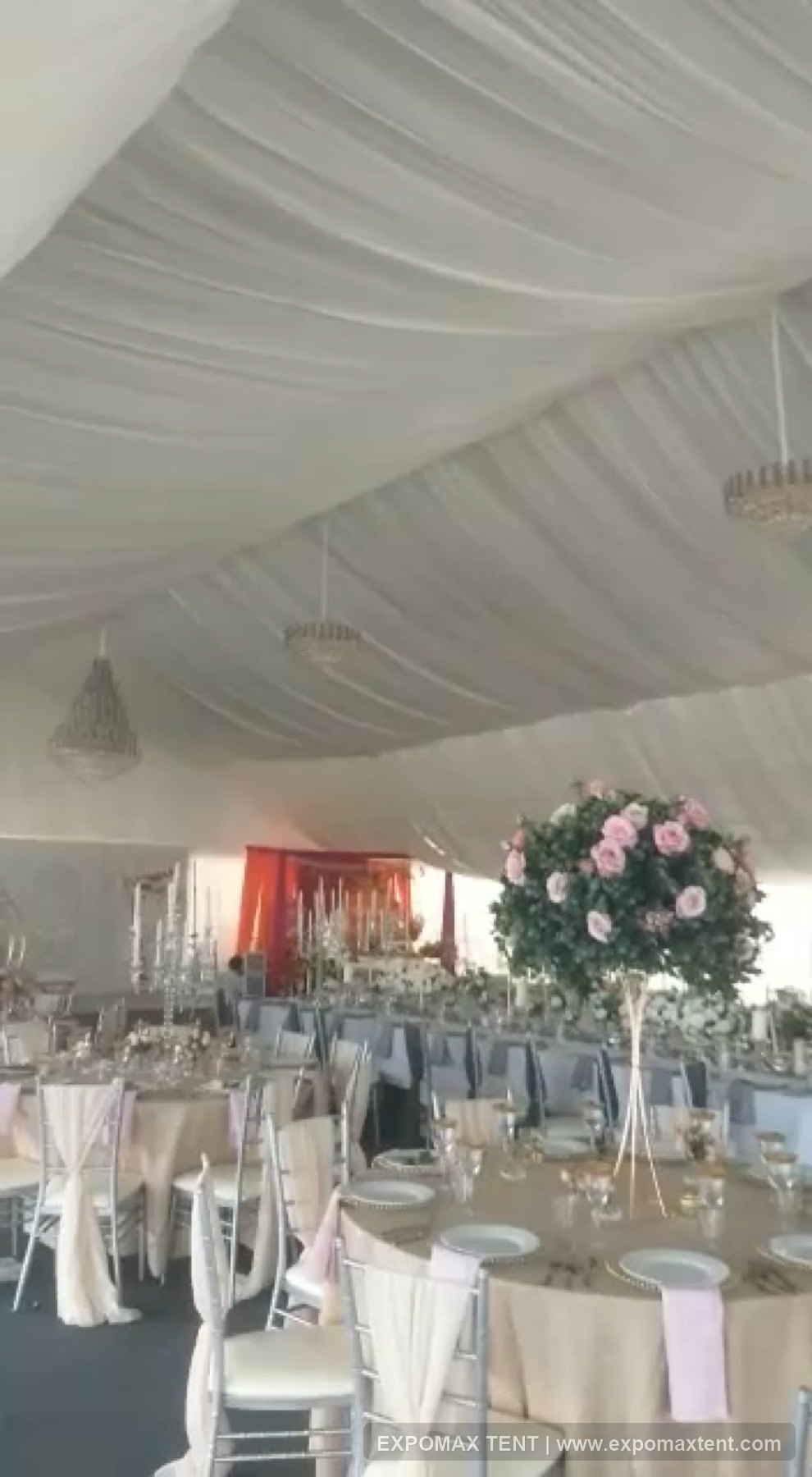 Wedding banquet setup inside Birmingham hotel tent