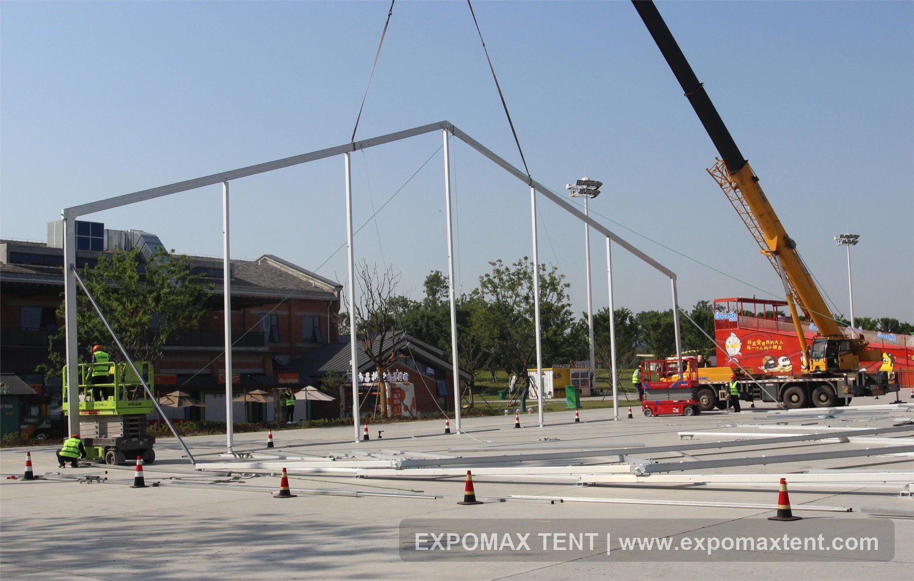 Main aluminum frame lifting during tent installation