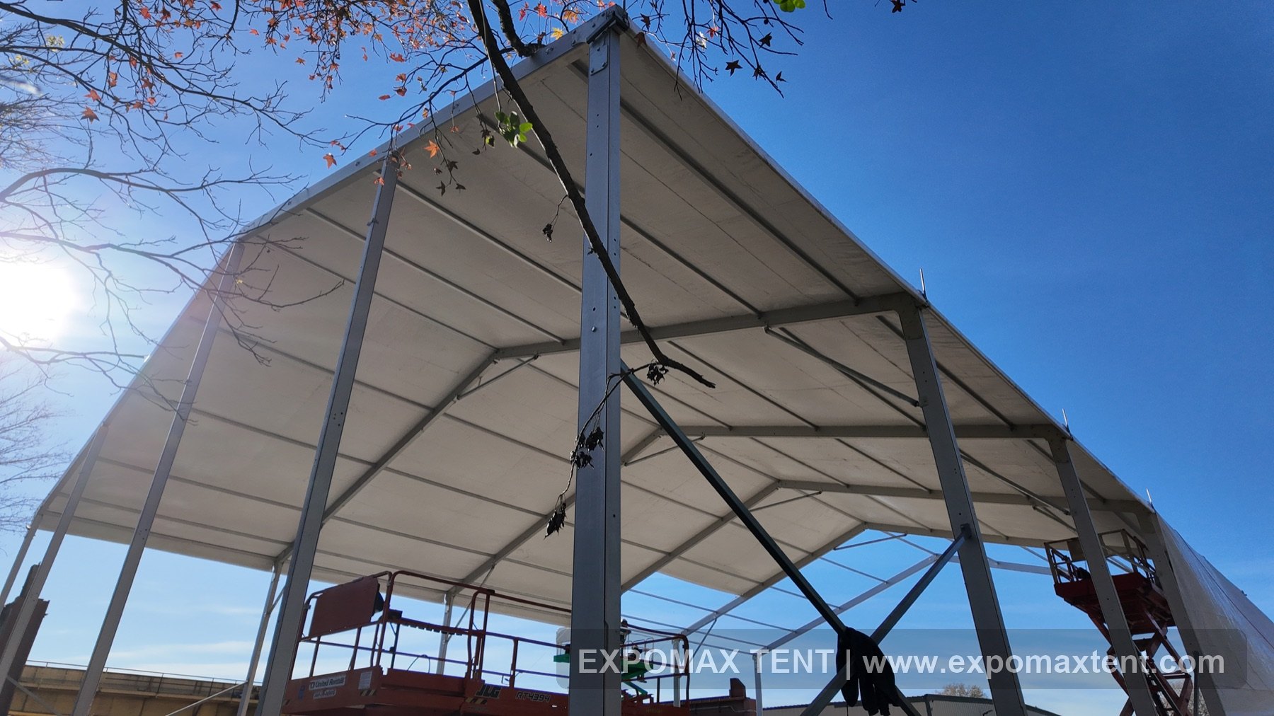 Roof fabric installation on temporary workshop frame