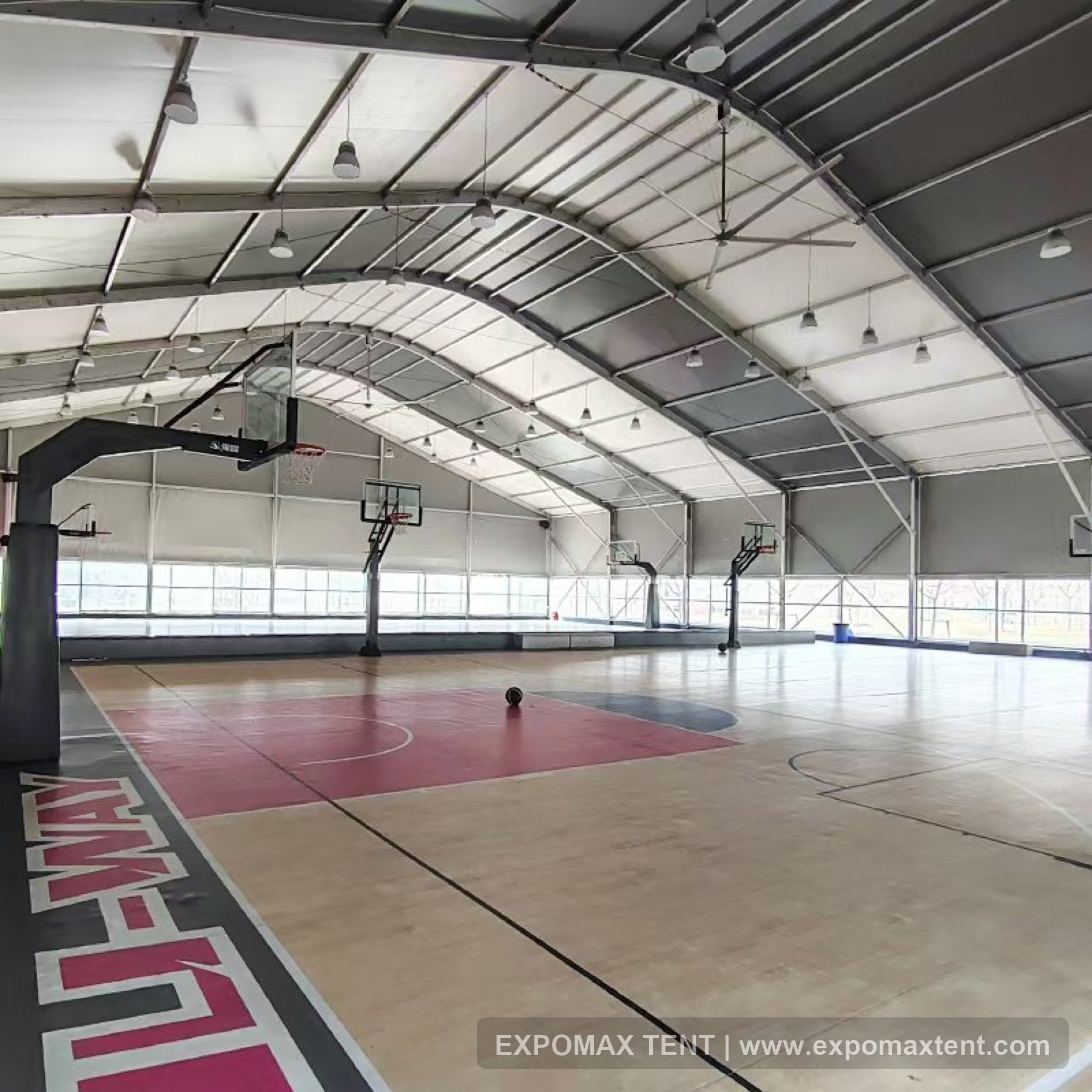 Basketball court inside a tent structure