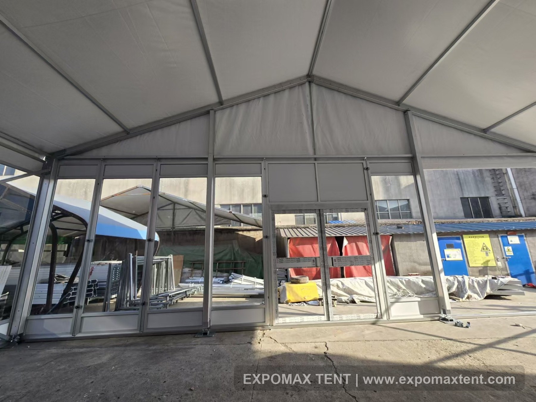 Glass wall and glass door system for an event tent